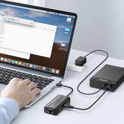 2. Ugreen 20265 USB-A / RJ45 1000 Mbps Hub 3x USB 3.0 Netzwerkadapter - Schwarz
