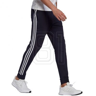 3. adidas Essentials Fleece Tapered Cuff 3-Band M GK8823 Hose