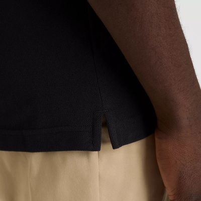 5. New Balance Baumwoll-Piqué-Poloshirt M MT51519BK