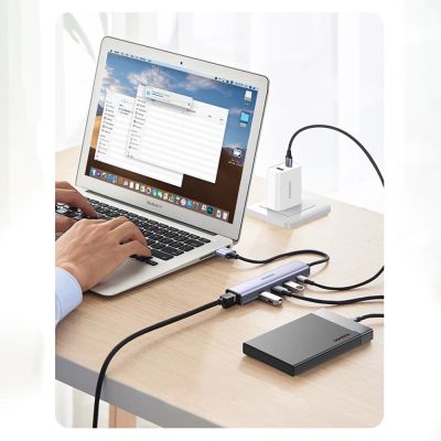 18. Ugreen Multifunktionsadapter HUB USB 3.0 - 3 x USB / Ethernet RJ-45 / USB Typ C PD grau (CM475)