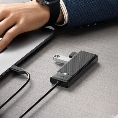 5. Orico PAPW4A-C3 USB-Hub mit 4 Anschlüssen (4x USB-A 3.0, 0,15 m Kabel) – Schwarz