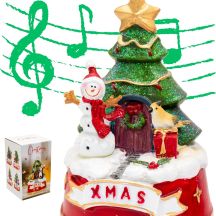 Schneemann spielt Weihnachtsdekoration