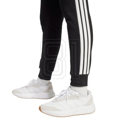 6. adidas Essentials 3-Streifen Fleece Slim W Hose JX2543