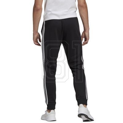 8. adidas Essentials Tapered Cuff 3 Stripes M GK8831 Hose