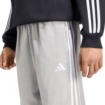 4. adidas Essentials Herrenhose mit 3 Streifen, Single-Jersey-Schnitt, schmal zulaufendem Bein und offenem Saum, Grau, KY4215