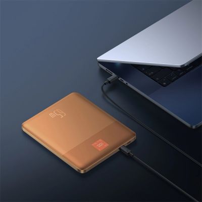 9. Baseus Blade2 12000mAh 65W Powerbank mit Digitalanzeige (mit Baseus Mini White Series USB-C - USB-C 100W (20V/5A) 50cm weißes Kabel) - Orange