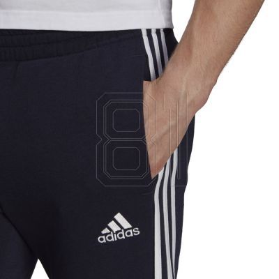 5. adidas Essentials Tapered Cuff 3 Stripes M GK8977 Hose
