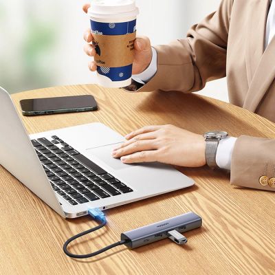 10. Ugreen Multifunktionsadapter HUB USB 3.0 - 3 x USB / Ethernet RJ-45 / USB Typ C PD grau (CM475)