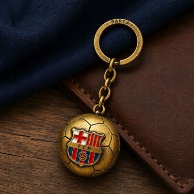 6. Original lizenzierter FC Barcelona Schlüsselanhänger in Form eines goldenen Balls mit dem Wappen B7081