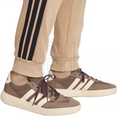 6. adidas Essentials 3-Streifen Fleecehose M JX0712