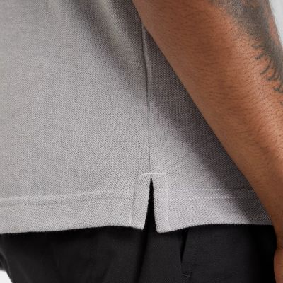 5. New Balance Baumwoll-Piqué-Poloshirt M MT51519AG