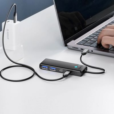 7. Hub USB-C Orico PAPW2AC-C3 Dockingstation 2x USB-A 3.0 + 2x USB-C 3.0 - schwarz