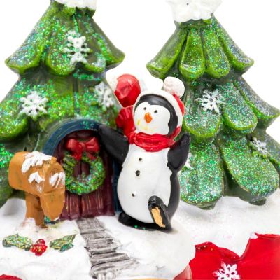 15. Weihnachtsdekoration mit spielenden Pinguinen