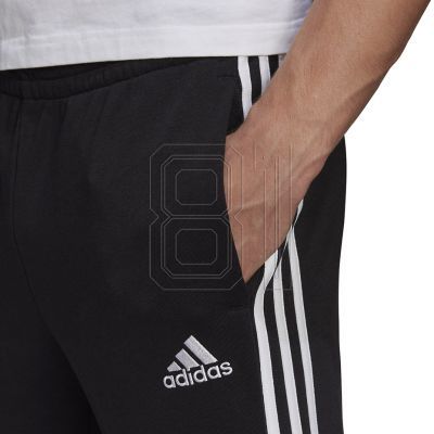 9. adidas Essentials Tapered Cuff 3 Stripes M GK8831 Hose