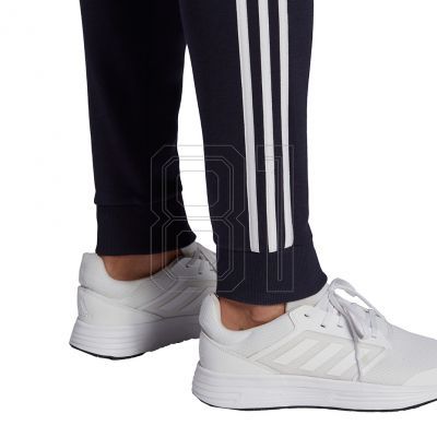 6. adidas Essentials Fleece Tapered Cuff 3-Band M GK8823 Hose