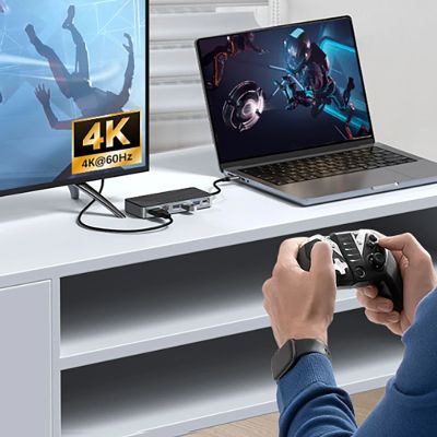 4. Orico OM28PR-G2 USB-C-Dockingstation mit M.2-Laufwerkssteckplatz + 1 x USB-A 3.2 + 1 x USB-C 3.2 + 2 x USB-A 2.0 + 1 x HDMI + 1 x Ethernet - Schwarz