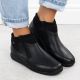 7. Rieker 47270-00 bequeme schwarze wasserdichte Leder-Damenstiefeletten