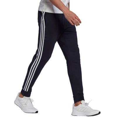 9. adidas Essentials Fleece Tapered Cuff 3-Band M GK8823 Hose